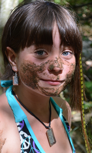 Shoshonoe camper with mud on her face